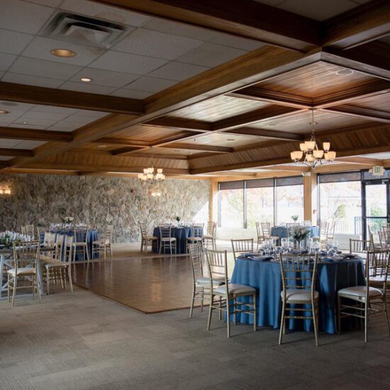 View of the White Oak Dance Floor with table seating | Cropped | Gabriellas Event Space | The Aviator Event Venue in Cleveland